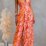 Vestido maxi tipo cami con espalda descubierta, recortes, estampado floral, volante y abertura lateral
