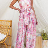 Vestido sin tirantes de estampado floral con lazo en la cintura y abertura en la pierna, de pierna ancha