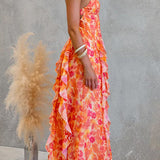 Vestido maxi tipo cami con espalda descubierta, recortes, estampado floral, volante y abertura lateral