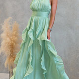Vestido maxi con escote halter y volantes de caída fluida