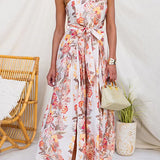 Vestido sin tirantes de estampado floral con lazo en la cintura y abertura en la pierna, de pierna ancha