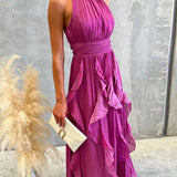 Vestido maxi con escote halter y volantes de caída fluida