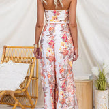 Vestido sin tirantes de estampado floral con lazo en la cintura y abertura en la pierna, de pierna ancha