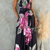 Vestido sin tirantes con cintura anudada, pierna amplia y estampado floral