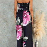 Vestido sin tirantes con cintura anudada, pierna amplia y estampado floral