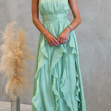 Vestido maxi con escote halter y volantes de caída fluida
