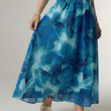 Sylin™ | Vestido midi fruncido con cuello halter