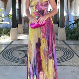 Vestido maxi plisado de tirantes finos con estampado floral y cintura entallada