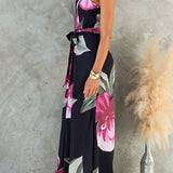 Vestido sin tirantes con cintura anudada, pierna amplia y estampado floral