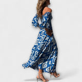 Bella - Vestido con hombros descubiertos y flores del océano