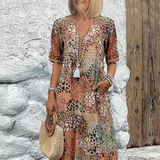Roxanne™ | Vestido midi envolvente floral vibrante