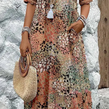 Roxanne™ | Vestido midi envolvente floral vibrante