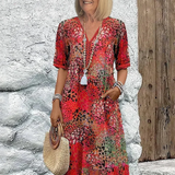 Roxanne™ | Vestido midi envolvente floral vibrante