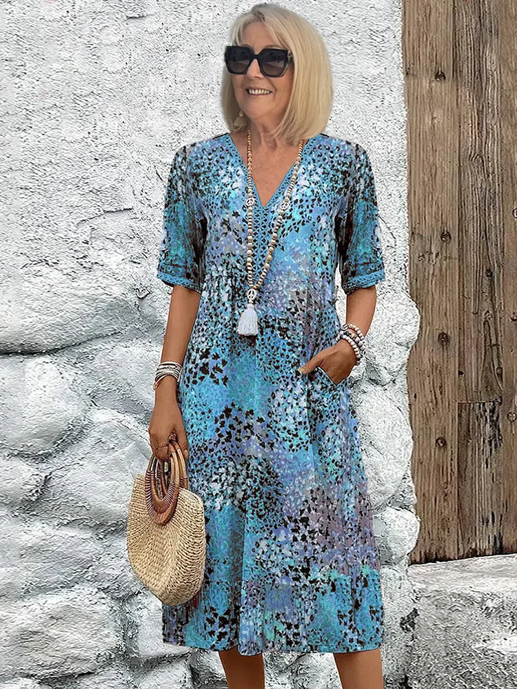 Roxanne™ | Vestido midi envolvente floral vibrante