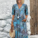 Roxanne™ | Vestido midi envolvente floral vibrante