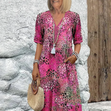 Roxanne™ | Vestido midi envolvente floral vibrante